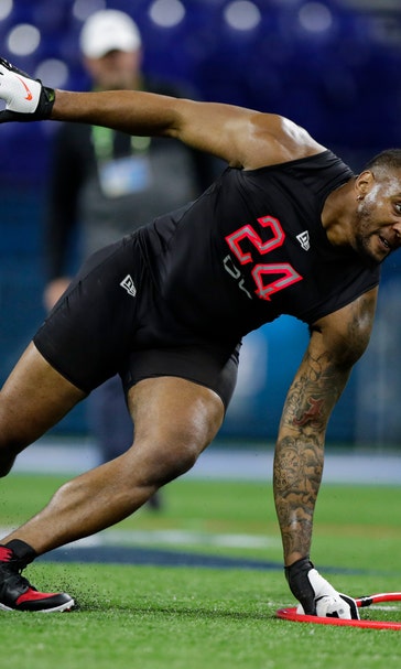 Needing blockers for Tagovailoa, Dolphins draft Hunt